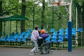 NDIS participant enjoying community access support at a local park